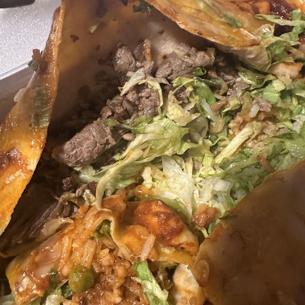 El Jacalito - Other half of the burrito, it has some carne asada. - Mexican Near Me - Lomita, California