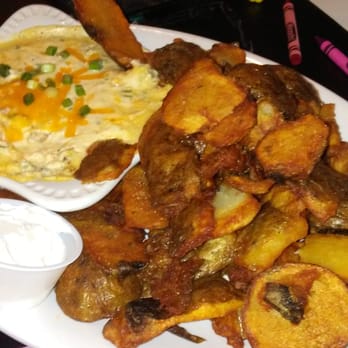 Maple Leaf Diner - Potatoe skins with a sour cream dip - American Near Me - Dallas, Texas Maple Leaf Diner - Potatoe skins with a sour cream dip - American Near Me - Dallas, Texas