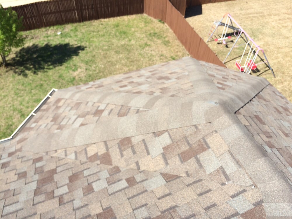 Slide of Whatley Roofing