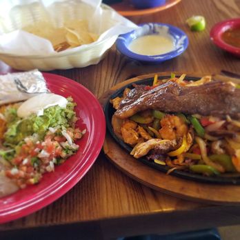 El Puerto Mexican Grill & Bar - Puerto fajitas- steak, chicken, chorizo Mexican sausage, shrimp & bed shirt ribs - Mexican Near Me - Clinton, Missouri