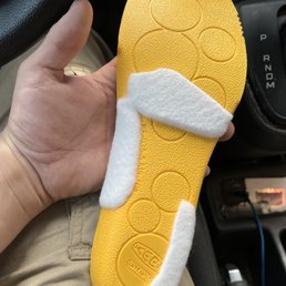 Custom pads affixed to the insoles for support. Custom pads affixed to the insoles for support.