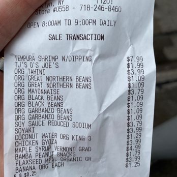 Trader Joe's - A crumpled store receipt from Brooklyn, NY lists multiple food items, including shrimp, beans, and snacks, with prices and transaction details. - Grocery Near Me - Brooklyn, New York