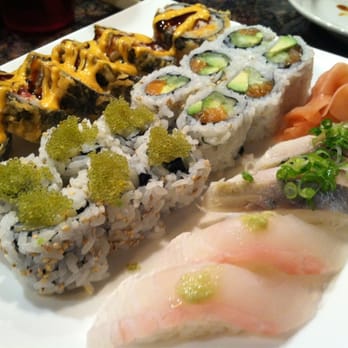 Sushi Bar - Top left: craze roll, squid with wasabi tobiko, salmon, fluke, and mackerel - Sushi Bars Near Me - Indianapolis, Indiana Sushi Bar - Top left: craze roll, squid with wasabi tobiko, salmon, fluke, and mackerel - Sushi Bars Near Me - Indianapolis, Indiana