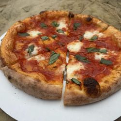 Margarita Pizza - Tomato sauce, fresh mozzarella, and fresh basil!