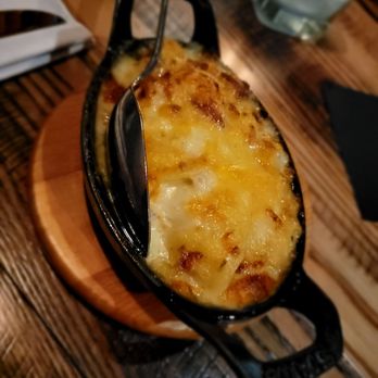 Charlie Palmer Steak - Side of au gratin potatoes - Steakhouses Near Me - Napa, California