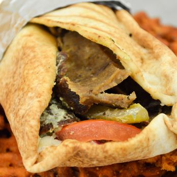 Just Falafel - a pita and sweet potato fries - Falafel Near Me - Houston, Texas