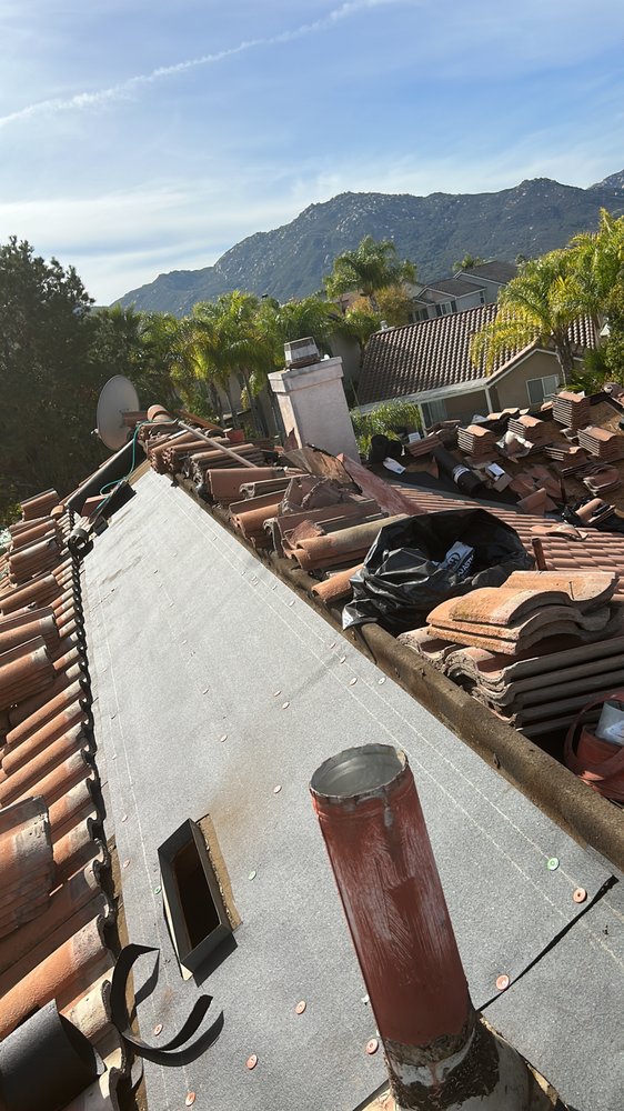 Slide of Alexander’s Roofing