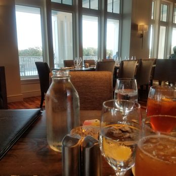 34° North Restaurant + Bar - Inside table by the water. Nice table in this newly opened restaurant - Bars Near Me - Beaufort, North Carolina 34° North Restaurant + Bar - Inside table by the water. Nice table in this newly opened restaurant - Bars Near Me - Beaufort, North Carolina