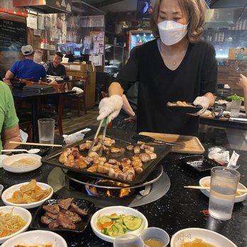 Ssam Tong - Thick cut pork belly ready to come off the grill - Korean Near Me - Flushing, New York