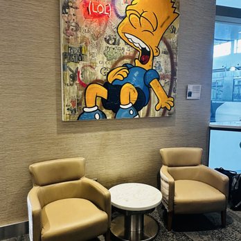 Delta SkyClub A43 - Loved the art and comfy seating in this lounge. - Airport Lounges Near Me - Detroit, Michigan