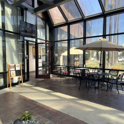 Bixby Plaza Cafe - Seating area inside the lobby of the Ranch building (you can see the outside table in the background)