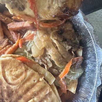 Sunset Bagels Cafe & Grill - Philly cheese steak panini but got mostly onions and peppers!! - Sandwiches Near Me - Brooklyn, New York Sunset Bagels Cafe & Grill - Philly cheese steak panini but got mostly onions and peppers!! - Sandwiches Near Me - Brooklyn, New York