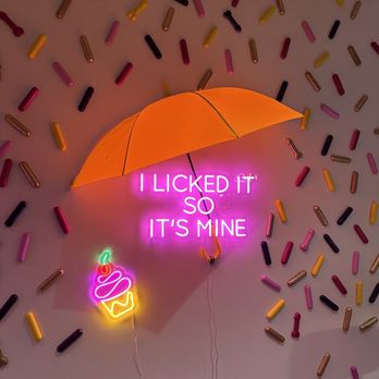 Tiphanie's - a neon sign that says lucked it so it's mine - Bakeries Near Me - Davenport, Iowa