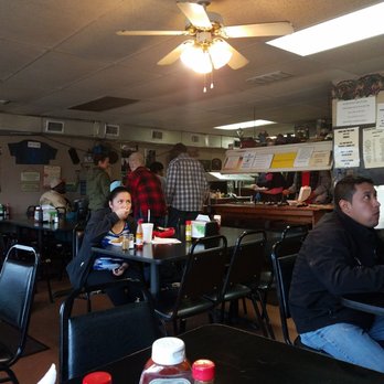 Food For The Soul - people sitting at tables in a restaurant - Southern Near Me - Athens, Georgia Food For The Soul - people sitting at tables in a restaurant - Southern Near Me - Athens, Georgia