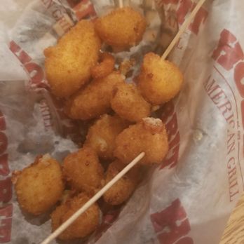 Hobbit American Grill - Cheese curds (minis the 4 we ate before I took this picture). This little for $7.95 - Burgers Near Me - Tallahassee, Florida Hobbit American Grill - Cheese curds (minis the 4 we ate before I took this picture). This little for $7.95 - Burgers Near Me - Tallahassee, Florida