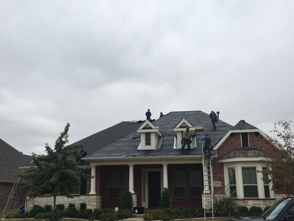 Slide of DNA Roofing & Construction