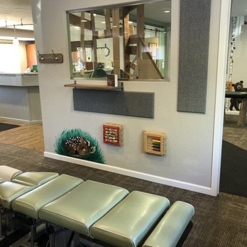 Lighthouse Chiropractic - Littles also enjoy playing with the games while their parents or grandparents get adjusted - Chiropractors Near Me - Fort Collins, Colorado