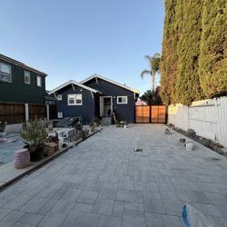 Juarez And Sons Landscaping - Yard with pavers before new fence