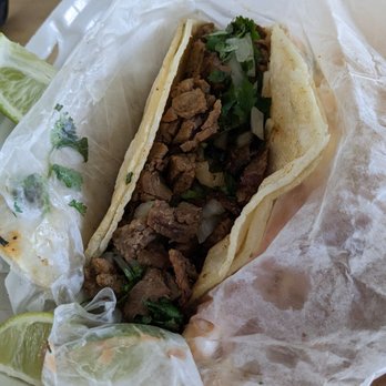 Toros Taqueria - Not the most flattering of photos, but that's one meaty taco. Two tacos + rice + beans + aguas as a meal is definitely filling. - Tacos Near Me - Norwalk, California Toros Taqueria - Not the most flattering of photos, but that's one meaty taco. Two tacos + rice + beans + aguas as a meal is definitely filling. - Tacos Near Me - Norwalk, California