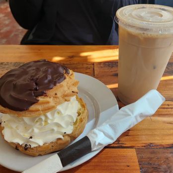 Birkholm's Bakery & Cafe - Chocolate cream puff and iced vanilla latte - Bakeries Near Me - Solvang, California