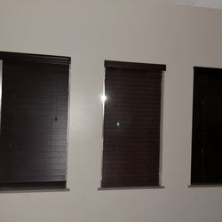 Potawatomi Inn - The three windows with blinds, but you can still see the light pouring in from outside. Room 123