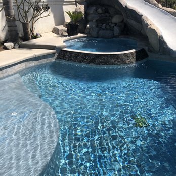 Legacy pools - final result-clean tile, blue walls and beautiful pool! - Pool Cleaners Near Me