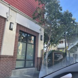 Entrance in middle of parking lot