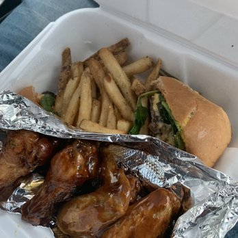 Pra_LEES - Hamburger with wings and fries - Seafood Near Me - New Orleans, Louisiana Pra_LEES - Hamburger with wings and fries - Seafood Near Me - New Orleans, Louisiana