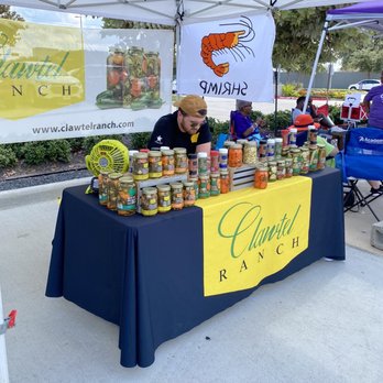 Memorial Market - a man selling canned food - Grocery Near Me - Houston, Texas Memorial Market - a man selling canned food - Grocery Near Me - Houston, Texas