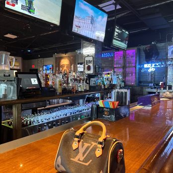 Boonies Wild West Saloon - a purse on the bar - American Near Me - Loxahatchee Groves, Florida