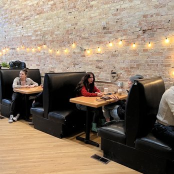 North Perk Coffee - a group of people sitting at tables - Coffee & Tea Near Me - Petoskey, Michigan North Perk Coffee - a group of people sitting at tables - Coffee & Tea Near Me - Petoskey, Michigan