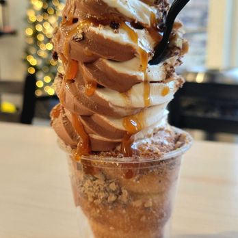 Crispy Cones - Traditional cone with swirl soft serve, Heath topping, cookie butter spread, and caramel sauce ($8.30) - Desserts Near Me - Ooltewah, Tennessee