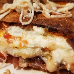 a slice of pizza on a plate a slice of pizza on a plate