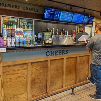 Tip Top Taps - a man standing at a bar - Beer, Wine & Spirits Near Me - Augusta, Georgia