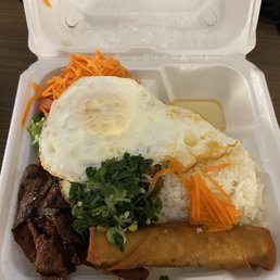 C6. Com Dac Biet : Combination with rice. Choice B (Grilled Pork, 2 Fried Eggs, & 1 Egg roll) $13.95