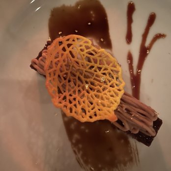 Chambar - Poire et Chocolat Baked ganache, chestnut cream, mulled wine pear compote, praliné caramel - Belgian Near Me - Vancouver, British Columbia Chambar - Poire et Chocolat Baked ganache, chestnut cream, mulled wine pear compote, praliné caramel - Belgian Near Me - Vancouver, British Columbia