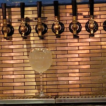 Happy Accidents - a row of beer taps in a bar - Bars Near Me - Albuquerque, New Mexico
