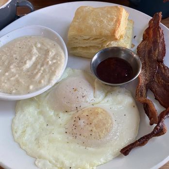 Biscuit Love - Franklin - Breakfast egg dish served with cheese grits, bacon, and a delicious biscuit with jam! - Breakfast & Brunch Near Me - Franklin, Tennessee