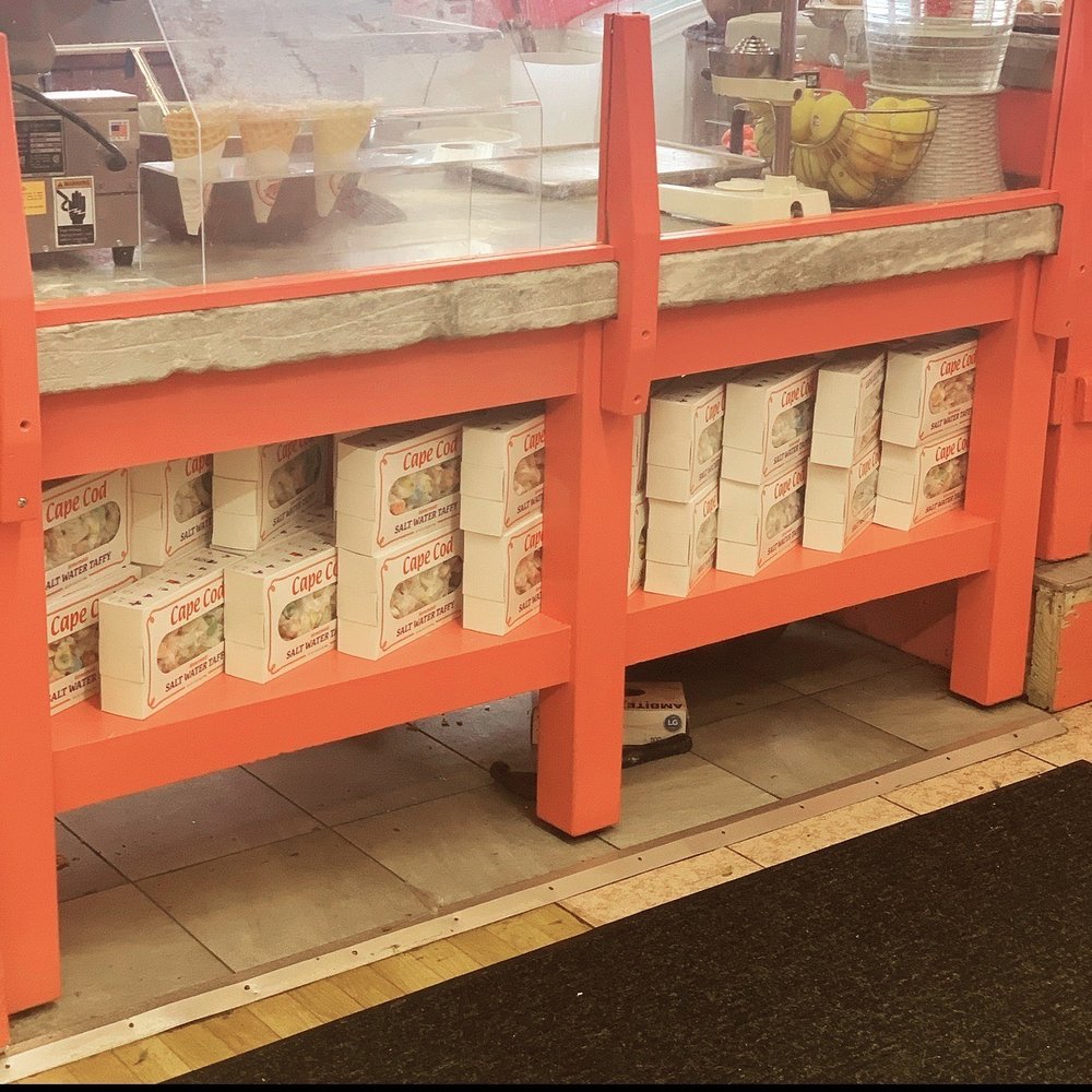 Kandy Korner - a counter with boxes of food on it - Candy Stores Near Me - Hyannis, Massachusetts Kandy Korner - a counter with boxes of food on it - Candy Stores Near Me - Hyannis, Massachusetts