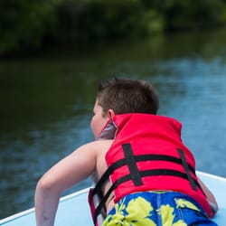 Green Boat Tours - My son checking out the tip of the boat whoa!