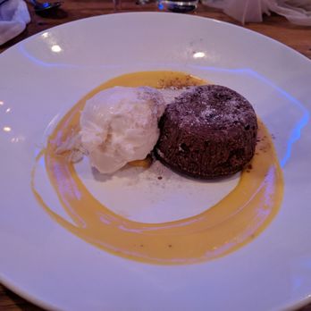 Zeugma Mediterranean Grill - Chocolate souffle. Very decadent - has a passion fruit sauce and yummy gelato. - Mediterranean Near Me - Montclair, New Jersey