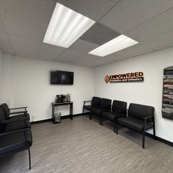 Empowered Prosthetics and Orthotics - Waiting room overview and coffee machine