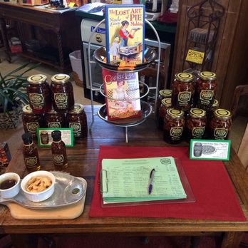 The Great San Saba River Pecan - Pecan praline syrup (front) and pecan pie in a jar (back) - Farmers Market Near Me The Great San Saba River Pecan - Pecan praline syrup (front) and pecan pie in a jar (back) - Farmers Market Near Me