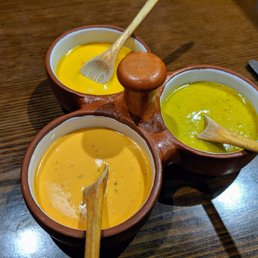 Sauces! Least to most spicy: green (wakatay), yellow (ají amarillo), orange (rocoto) Sauces! Least to most spicy: green (wakatay), yellow (ají amarillo), orange (rocoto)