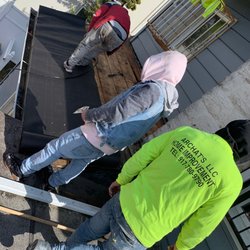 Archats - Removing and replacing shingles on a roof of a satisfied customer