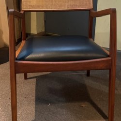 The Furniture Shop - A teak Risom chair with a new leather seat.