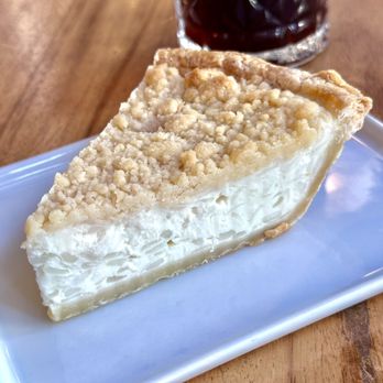 Hood Famous - Buko Pie. Coconut milk, shredded young coconut, cream, butter, brown sugar, vodka, vanilla. - Cafes Near Me - Seattle, Washington Hood Famous - Buko Pie. Coconut milk, shredded young coconut, cream, butter, brown sugar, vodka, vanilla. - Cafes Near Me - Seattle, Washington