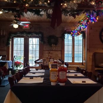 The Cellar on Oakwood - a dining room decorated for christmas - Pizza Near Me - Oak Creek, Wisconsin The Cellar on Oakwood - a dining room decorated for christmas - Pizza Near Me - Oak Creek, Wisconsin