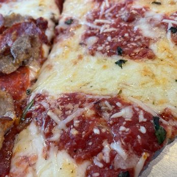 NY Pie - Grandma's Pie. Slice close up version.  Yummy pizza - Pizza Near Me - Nashville, Tennessee