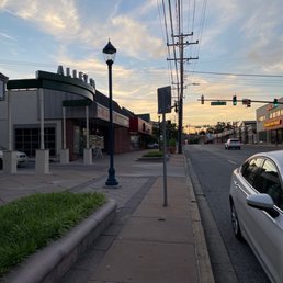 a white car parked on the side of the road